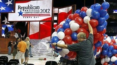 A technician prepares balloons to be dropped from the ceiling at the Republican National Convention in Tampa, Florida on Friday. The convention starts Monday.