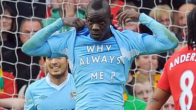 Mario Balotelli famously flashed the 'Why Always Me?' shirt while with Manchester City in 2011. Andrew Yates / AFP / October 23, 2011