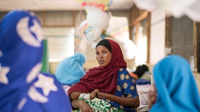 Howam with her four months old baby Fatam Usman Ali.