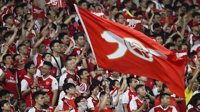 Arsenal fans show their support during the Premier League side's International Champions Cup match against Bayern Munich at Shanghai Stadium. Lintao Zhang / Getty Images