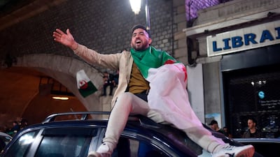 Algerians celebrate in Algiers. AFP