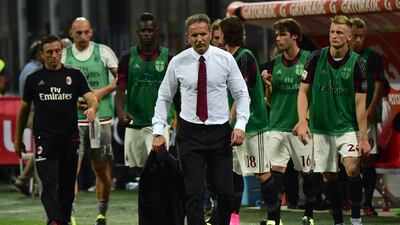 his file photo taken on August 29, 2015 shows AC Milan's coach from Serbia Sinisa Mihajlovic leaving the pitch during the Italian Serie A football match between AC Milan and Empoli at San Siro Stadium in Milan on August 29, 2015. AC Milan have announced the sacking of coach Sinisa Mihajlovic, replacing the Serbian with youth team handler Cristian Brocchi until the end of the season. AFP / GIUSEPPE CACACE
