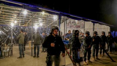 Lebanese policemen surround and protected the tent of Lokman Slim after a clash with the protesters during a dialogue meeting in downtown beirut, Lebanon. EPA