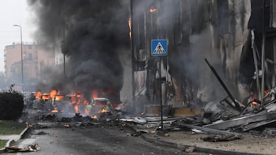 The building struck by a plane in the San Donato Milanese district of Milan. Photo: EPA