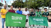 A group of fans support Saudi Arabia outside the Fifa fan fest in Miami. Kyle Fitzgerald / The National