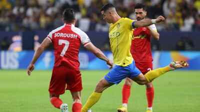 Cristiano Ronaldo lines up a shot against Persepolis. AFP