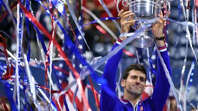 7. US Open. Novak Djokovic of Serbia celebrates with his winning trophy in New York. Jewel Samad / AFP Photo