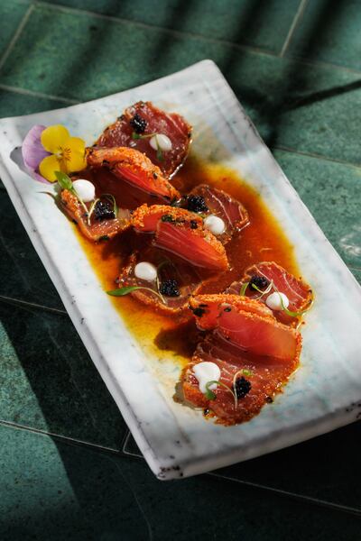 The seared tuna has a kick of spice. Photo: Tattu Restaurant Dubai