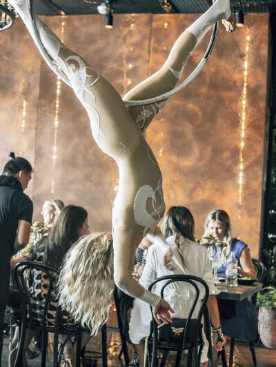 An aerial artist at Queenie's Brunch at The London Project