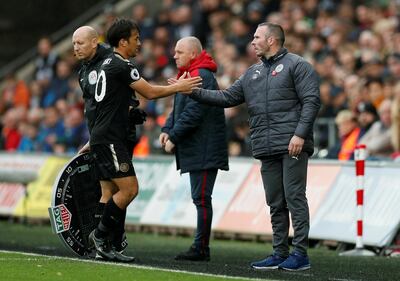 Shinji Okazaki, left scored the winner to ensure Michael Appleton, right, won his first game in caretaker charge of Leicester City. John Sibley / Reuters