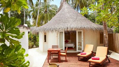 A beach villa at Sun Siyam Vilu Reef, where stays cost from $245 per night.