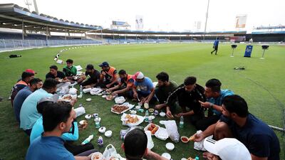 Players breaking their fast before the start of Sharjah Ramadan Cup final.