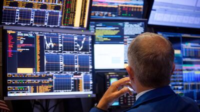 A trader works on the floor of the New York Stock Exchange (NYSE) in New York. US stocks climbed following gains in Europe as OPEC's plans to boost output less than some investors had anticipated sent oil on a tear. Oil prices are expected to moderate over the coming months on the back of output increases from Saudi Arabia, with GCC countries expected to increase production as well in the second half of the year according to Abu Dhabi Commercial Bank. Photographer: Michael Nagle/Bloomberg