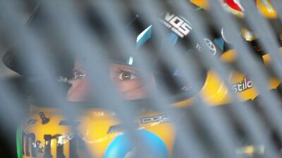 Kyle Busch, driver of the M&M’s Red Nose Toyota, looks on during practice for the Nascar Sprint Cup Series Go Bowling 400 at Kansas Speedway. AFP / JERRY MARKLAND