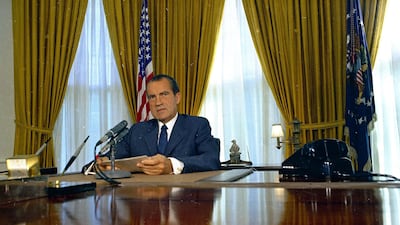 President Richard Nixon is seen in the Oval Office of the White House, 1969. AP Photo