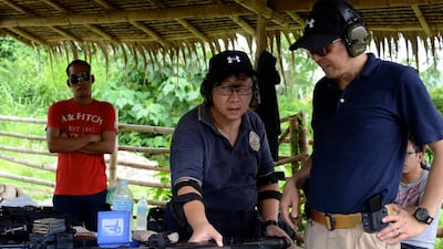 Father Salvador Pablo otherwise known as ‘Father Boy’ is no ordinary Salesian Priest. He is also a dead shot with a love for guns and motorbikes. Aya Lowe for The National