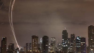 Israeli air defence systems intercept missiles over Tel Aviv during the 12-day war with Iran in June last year. EPA