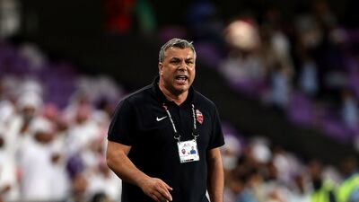 Al Ahli manager Cosmin Olaroiu shown during an Arabian Gulf League match against Al Ain earlier this month. Satish Kumar / The National / April 2, 2015