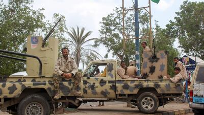 Members of Yemen's southern separatist-dominated Security Belt Forces stand guard during a meeting of the Southern Transitional Council (STC) in the southwestern coastal city of Aden, on January 13, 2020. AFP / Saleh Al-OBEIDI