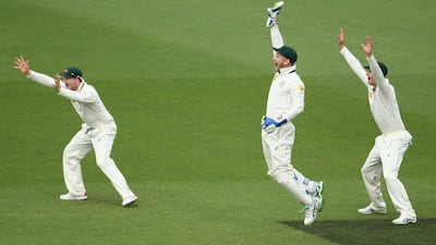 Steve Smith, left, shown with Australia teammates on Sunday during Day 4 of the first Test against New Zealand, which they won on Monday. Mark Kolbe / Getty Images / November 8, 2015