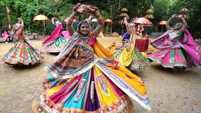 Women in traditional clothing rehearse the Garba, a traditional dance of Gujarat state, before the Navratri, or Nine Night, festival in Ahmedabad, India. AP