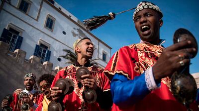 A Gnawa traditional group performs in the city of Essaouira to celebrate the decision to add the Gnawa culture to Unesco's list of Intangible Cultural Heritage of Humanity. AFP