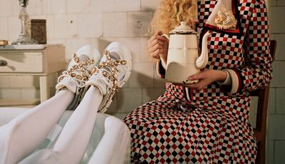 Continuing with a no-head trend, the campaign relies on props and patterns in equal measure