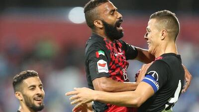 Al Ahli (red/black) showed the fire that manager Cosmin Olaroiu had said was lacking in recent matches with a 3-1 win over Al Nasr. Ashraf Al Amra / Al Ittihad