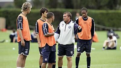 Brendan Rodgers, centre, talks to players during his time as a coach at Chelsea.