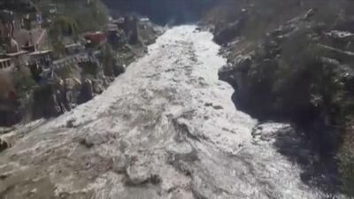A flood in Uttarakhand state, February 7, 2021, is shown in this still obtained from a video. Reuters