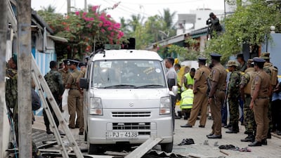 Security personnel seen at the site of an overnight gun battle, between troops and suspected terrorists, on the east coast of Sri Lanka, in Kalmunai. Reuters