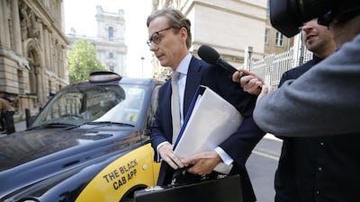 Cambridge Analytica's former CEO Alexander Nix arrives to give evidence to Parliament's Digital, Culture, Media and Sport (DCMS) Committee at Portcullis House in central London on June 6, 2018. Cambridge Analytica suspended chief executive Alexander Nix on March 20 after recordings emerged of him boasting that the firm played an expansive role in the Trump campaign, doing all of its research, analytics as well as digital and television campaigns. / AFP / Tolga AKMEN