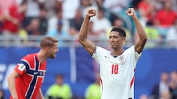 England's midfielder #10 Jude Bellingham celebrates after scoring his second goal during the first half of the extra-time of the 2026 World Cup football tournament quarter-final match between Norway and England at Miami Stadium in Miami Gardens on July 11, 2026. (Photo by PATRICIA DE MELO MOREIRA / AFP)