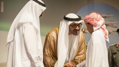 The Crown Prince of Abu Dhabi, centre, presents an Appreciation Medal to the family of martyr Sergeant-Maj Abdulaziz Khamis Ali Al Budaiwi. Donald Weber /Crown Prince Court - Abu Dhabi