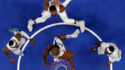 DALLAS, TEXAS - JUNE 04: Kawhi Leonard #2 of the LA Clippers rebounds the ball against the Dallas Mavericks during Game Six of the Western Conference first round series at American Airlines Center on June 04, 2021 in Dallas, Texas. NOTE TO USER: User expressly acknowledges and agrees that, by downloading and or using this photograph, User is consenting to the terms and conditions of the Getty Images License Agreement. Tom Pennington/Getty Images/AFP == FOR NEWSPAPERS, INTERNET, TELCOS & TELEVISION USE ONLY ==