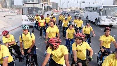 Cleveland Clinic Abu Dhabi caregivers hit the streets of Al Maryah island for #cycletoworkuae. Delores Johnson / The National