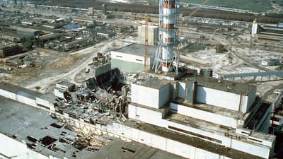 1986: An aerial view at the site of the worst nuclear disaster in history. In April 1986, the nuclear reactors at the Chernobyl ruptured and exploded, causing radioactive contamination in the surrounding areas. A few photographers risked exposure to radiation in order to document the disaster. This photograph was taken in May 1986 just weeks after the accident. Getty Images