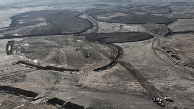 Sand dunes being prepared for planting south of Samawah in Kuwait, in an effort to curb desertification. AFP