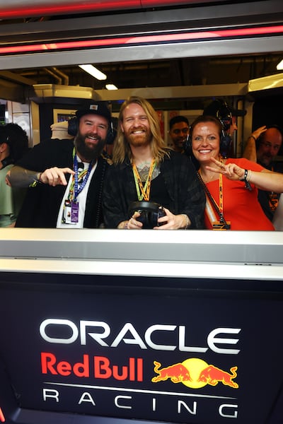 Sam Ryder, centre, at the Red Bull Racing garage during qualifying at Yas Marina Circuit. Getty Images