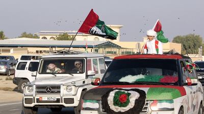 Hundreds of residents took the the streets of Umm al Quwain yesterday to participate in the National Day car parade. Jeffrey E Biteng / The National