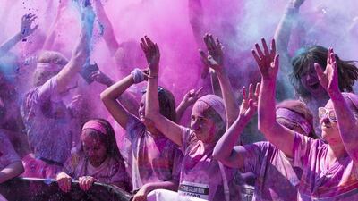 Runners take part in the Color Run Abu Dhabi at the Yas Marina. Silvia Razgova / The National