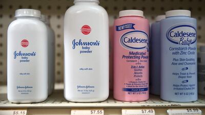 Johnson's baby powder bottles made by Johnson & Johnson sit on a shelf at Jack's Drug Store in San Anselmo, California. Sales of the talc-based baby powder had already been hit by changing consumer habits and fears the product causes cancer. AFP