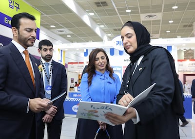 Abdulla Saif Ali Slayem Al Nuaimi, left, and Sheikha Bodour Al Qasimi at the Sharjah Pavilion at the Seoul International Book Fair. Photo: Sharjah Book Authority