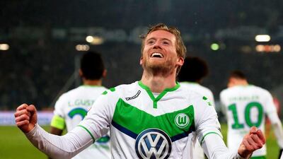 Wolfsburg's Andre Schurrle celebrates after scoring against Hannover in the Bundesliga on Tuesday night. Peter Steffen / EPA / March 1, 2016