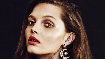 BURNISHED BEAUTY: Jumper, Dh1,730, 3.1 Phillip Lim at Bloomingdale’s. Earrings, Dh4,460, Percossi Papi at Net-A-Porter.