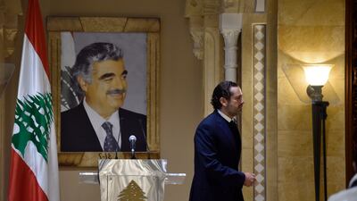 Former Lebanese Prime Minister Saad Hariri leaves the news conference after announcing his withdrawal from political life. EPA