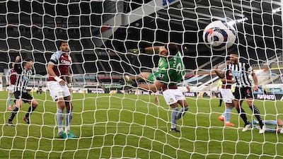 Newcastle United's Jamaal Lascelles scores the equaliser. Reuters