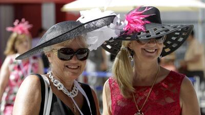 Two racegoers at the 20th running of the Dubai World Cup. Martin Dokoupil / Reuters