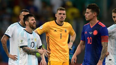 Argentina's Lionel Messi, left, looks dejected at the end of the match. AFP