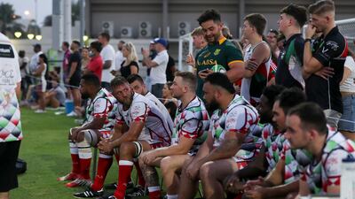 Abu Dhabi Harlequins players reflect on their win. Khushnum Bhandari/ The National